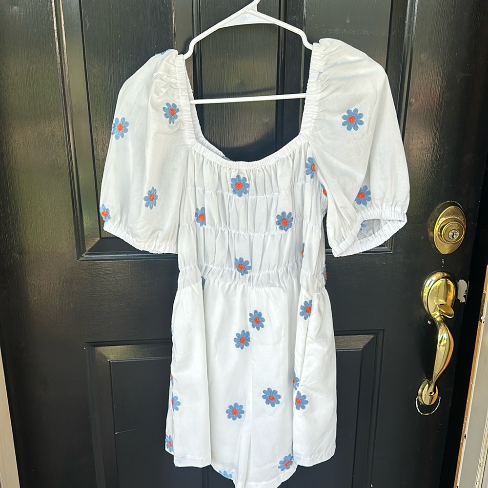 Women’s romper with blue and orange flowers